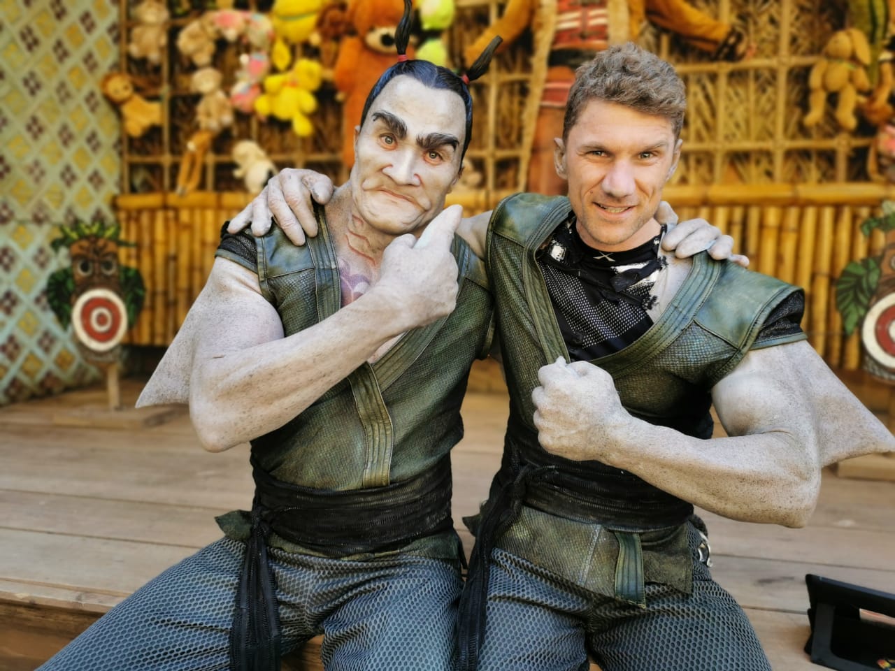 In costume and prosthetics between takes