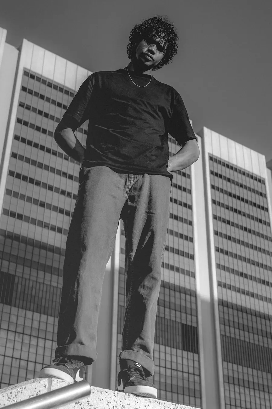 Cameron Groep on a rooftop edge