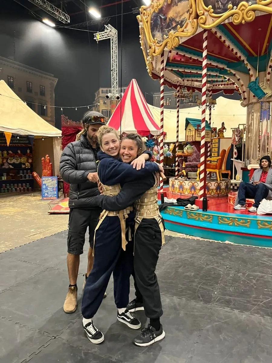 In costume between setups